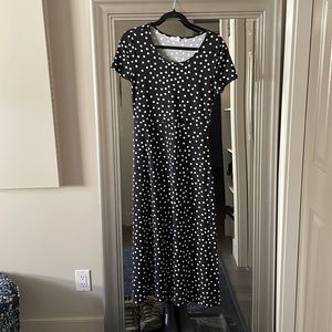 Tshirt weighted cotton dress . Mid calf length .